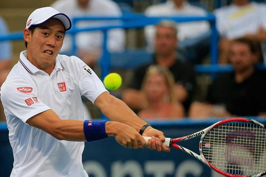 Kei Nishikori of Japan returns a shot to Richard Gasquet of France during the Citi Open at the William H.G. FitzGerald Tennis Center on Aug 1, 2014, in Washington, DC.&nbsp;Tennis star Kei Nishikori faces a race against time to be fit for this month'
