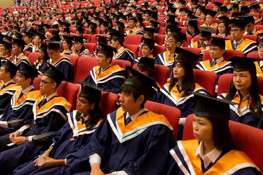 Nanyang Technological University graduates at their convocation ceremony. More undergraduates are taking up double degrees and majors outside their disciplines, in a bid to broaden their knowledge and become more employable. -- PHOTO: NANYANG TECHNOL