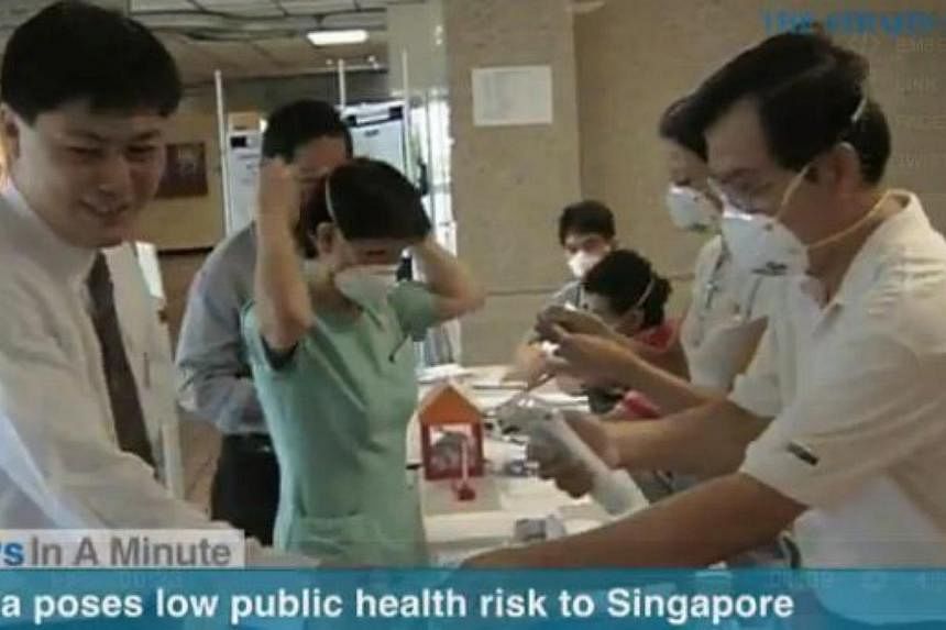 The Health Ministry said Singaporeans should not be alarmed by reports of Ebola cases overseas, as the disease poses a low public health risk to Singapore. -- PHOTO: SCREENGRAB FROM RAZORTV