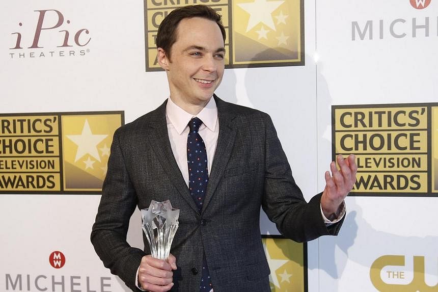 Actor Jim Parsons poses with the Best Actor in a Comedy Series award for The Big Bang Theory at the fourth annual Critics' Choice Television Awards in Beverly Hills, California on June 19, 2014. Parsons and co-stars Johnny Galecki and Kaley Cuoco hav