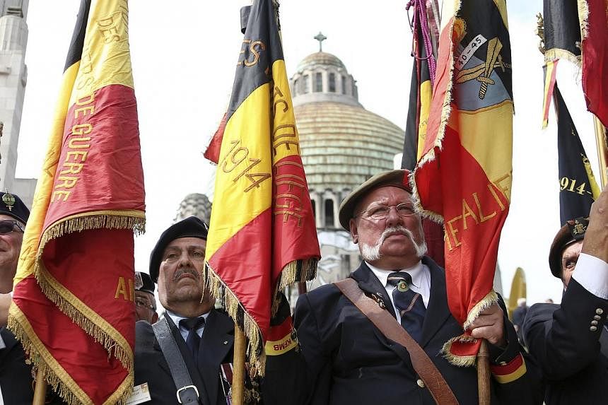 Veterans attend a ceremony at the Cointe Inter-allied Memorial, commemorating the 100th anniversary of the outbreak of World War I in Liege August 4, 2014. -- PHOTO: REUTERS