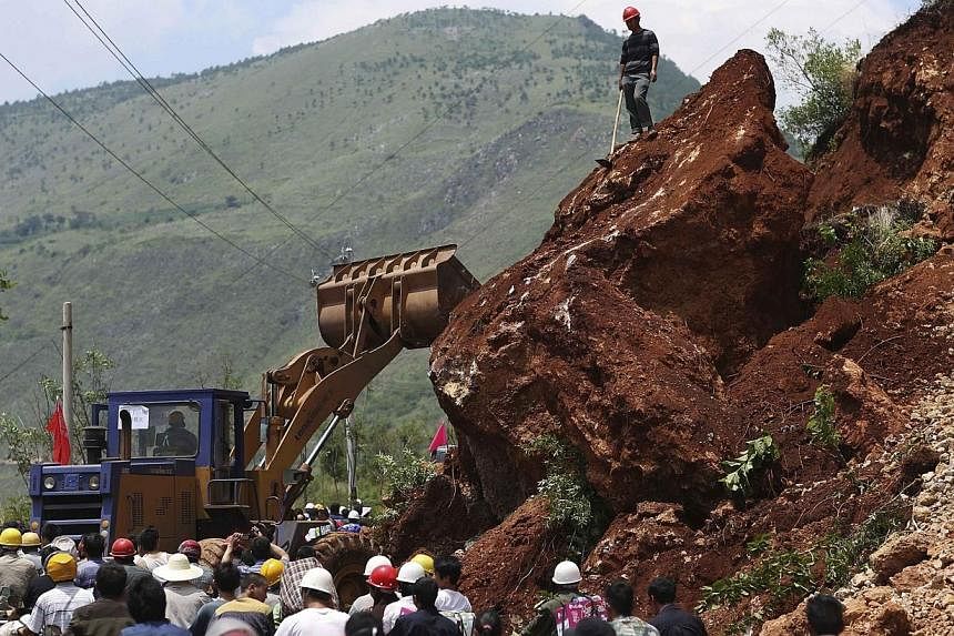 One of the main roads is seen blocked at the quake zone in Ludian county, Zhaotong, Yunnan province, August 5, 2014.&nbsp;The death toll from an earthquake that devastated a remote region of China jumped to nearly 600 people on Wednesday, authorities