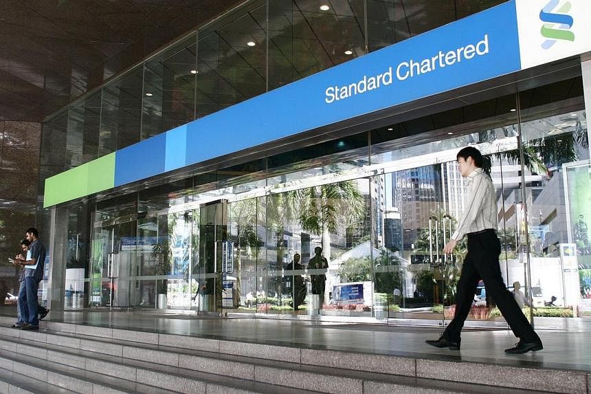 Standard Chartered said it faces another fine from New York’s financial regulator for problems related to detecting transactions vulnerable to money laundering, piling more pressure on the Asia-focused bank and its bosses. -- PHOTO: ST FILE&nbsp;