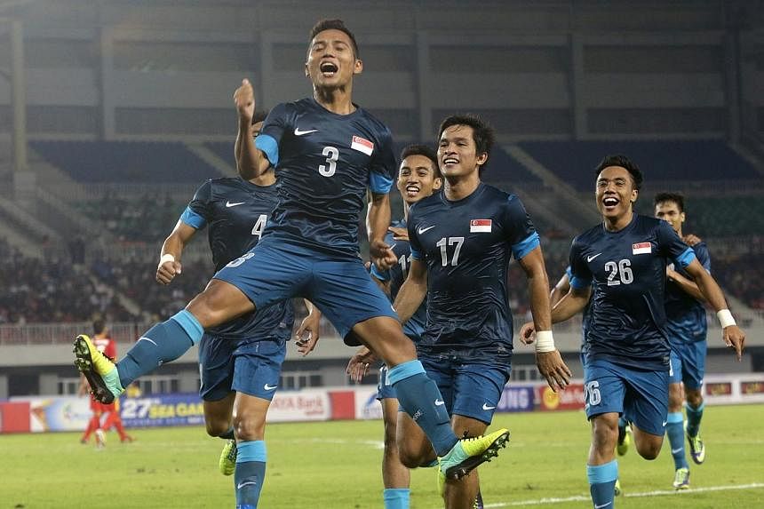 Singapore's Sahil Suhaimi celebrates a goal at the SEA Games in December 2013. He scored a brace against Bahrain's U-23 side to help Singapore's Under-23 football team win 3-2 in a friendly match on Tuesday in Manama, Bahrain. -- PHOTO: ST FILE&nbsp;