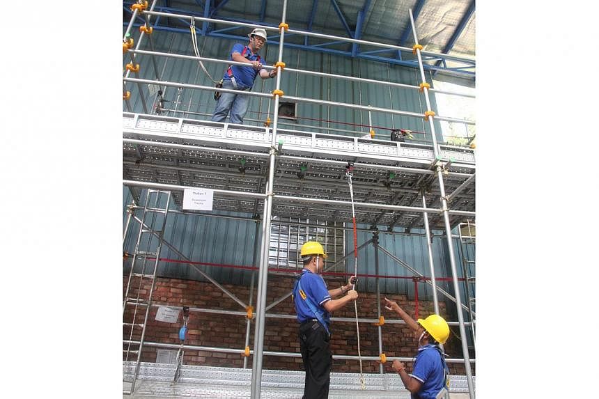 Workplace skills and safety training being conducted at a training centre. The Ministry of Manpower has taken action against 174 companies for more than 350 workplace safety violations uncovered during a month-long operation. -- PHOTO:&nbsp;ABSOLUTE 