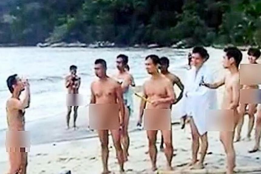 A still from a video showing 'naturists' participating in nude sports games at a beach said to be located in Teluk Bahang, Penang. --&nbsp;PHOTO: THE STAR/ASIA NEWS NETWORK&nbsp;