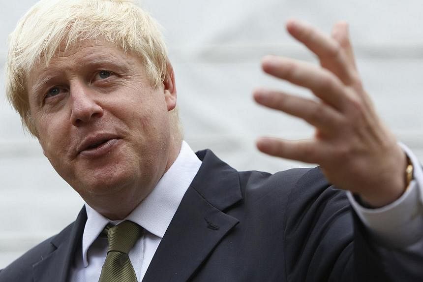 London Mayor Boris Johnson indicated Wednesday that he would stand for election to the House of Commons next year, a move that could eventually position him as a successor to British Prime Minister David Cameron. -- PHOTO: REUTERS