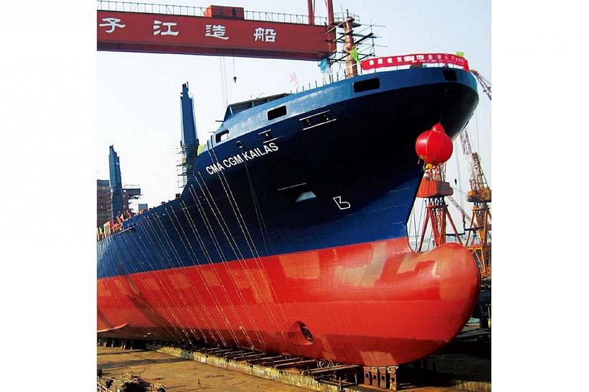 A ship under repair at a Yangzijiang shipyard in China. Mainboard-listed Chinese firm Yangzijiang Shipbuilding has reported a record quarterly earnings of 1.24 billion yuan (S$250.5 million), a 52 per cent spike in net profit from last year. -- PHOTO