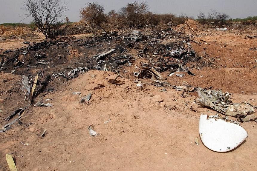 A picture taken on Aug 1, 2014 shows the wreckage of the Air Algerie flight AH5017 that crashed in the Gossi region in northern Mali on July 24.&nbsp;The cockpit voice recorder from the Air Algerie flight that crashed last month in northern Mali, kil