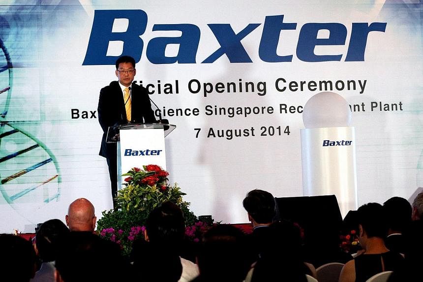 Mr Yeoh Keat Chuan, Managing Director, Economic Development Board of Singapore. Global healthcare company Baxter International opened its first biologics facility in Asia on Thursday, Aug 7, 2014. -- ST PHOTO: CHEW SENG KIM&nbsp;&nbsp;