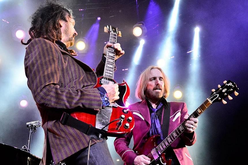Mike Campbell and Tom Petty perform at Viejas Arena in San Diego, California&nbsp;on Aug 3, 2014. -- PHOTO: AFP