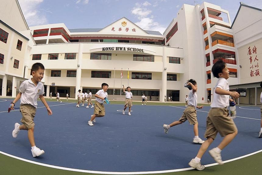 Kong Hwa School pupils at the campus on Guillemard Road. A couple put in 100 hours as volunteers at the school but they failed to get a spot for their six-year-old daughter in the Phase 2B balloting two weeks ago. -- PHOTO: ST FILE