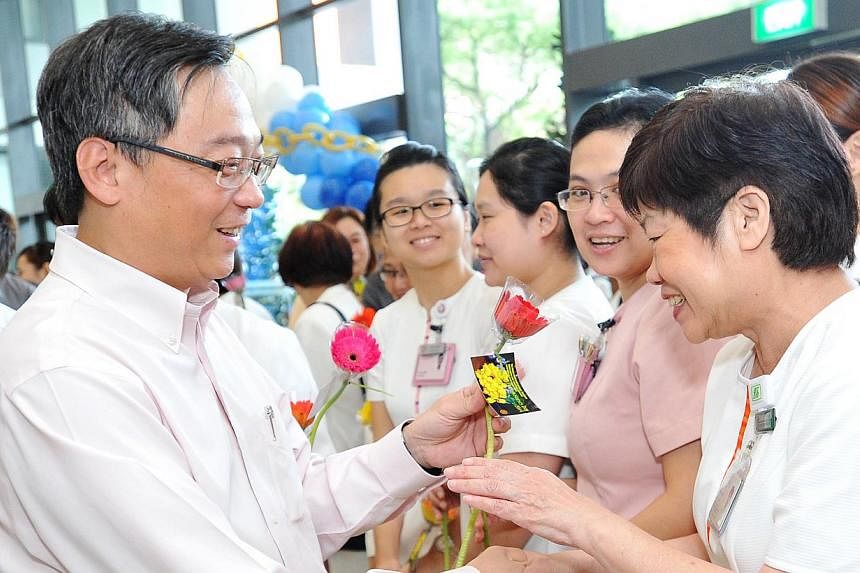 Health Minister Gan Kim Yong, seen here at a Nurses' Day celebration last week. -- ST PHOTO: LIM YAOHUI