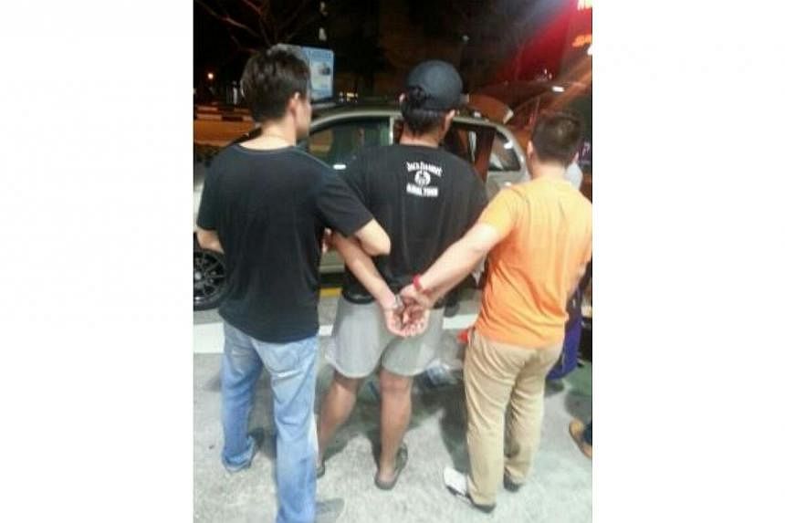 A suspect arrested during one of the operations.&nbsp;The Central Narcotics Bureau arrested 15 suspected drug traffickers and 96 drug abusers in a four-day island-wide sting that ended on Friday morning. -- PHOTO: CENTRAL NARCOTICS BUREAU