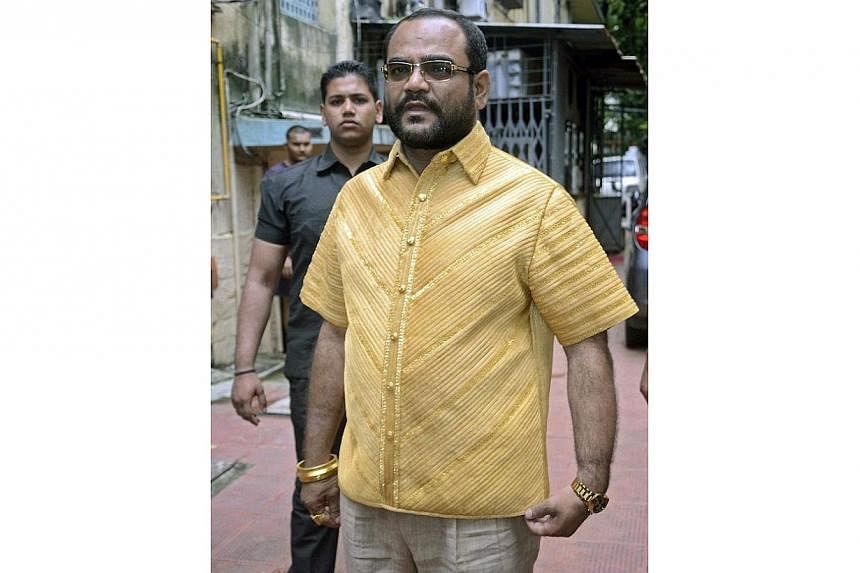 Mr Parakh loves gold so much that he commissioned a solid gold shirt, weighing more than 4kg, for his 45th birthday on Friday. -- PHOTO: EPA