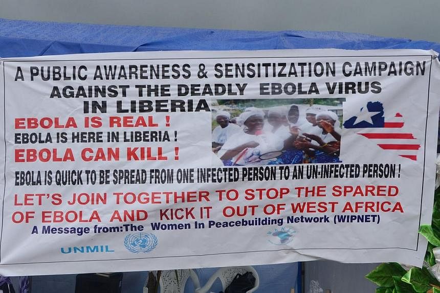 An Ebola information poster displayed in a street of Monrovia, Liberia&nbsp;on Aug 6, 2014.&nbsp;West Africa's raging epidemic of Ebola virus is an "extraordinary event" and now constitutes an international health risk, the World Health Organisation 