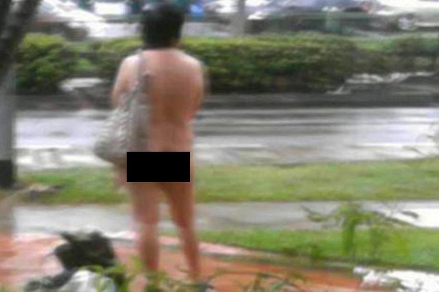 A Chinese woman in her 50s was arrested after boarding a bus naked on Dec 17, 2010. -- PHOTO: WANBAO READER