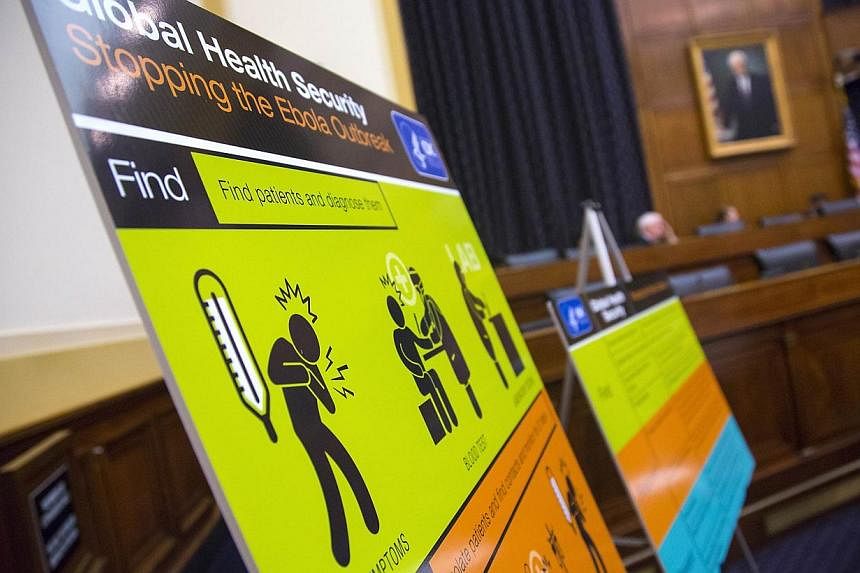 US Centers for Disease Control and Prevention (CDC) educational materials are displayed at a hearing of a House Foreign Affairs subcommittee, about the Ebola crisis in West Africa, on Capitol Hill in Washington on Aug 7, 2014. -- PHOTO: REUTERS