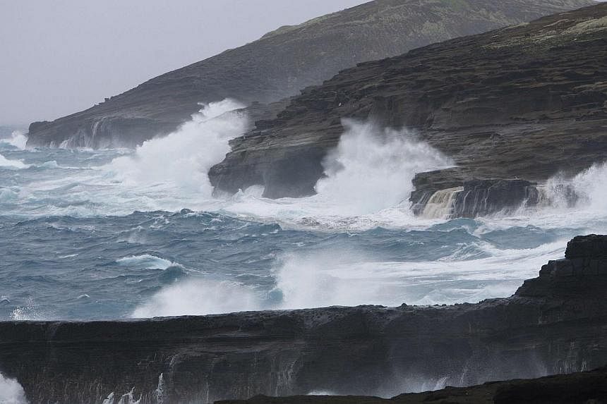 Large waves crash into the sea cliffs east side of Oahu as Tropical Storm Iselle passes through the Hawaiian islands, in Honolulu, Hawaii on Aug 8, 2014.&nbsp;Hawaii breathed a sigh of relief after escaping serious damage from Tropical Storm Iselle o