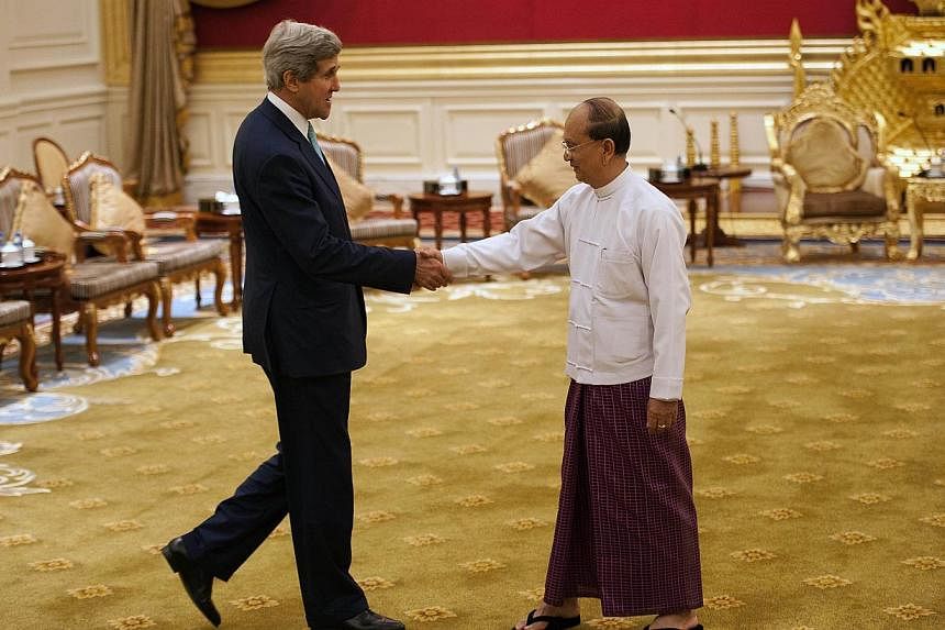 US Secretary of State John Kerry (left) shakes hands with Myanmar President Thein Sein (right) during their meeting at the Presidential hall outside the venue of the 47th Asean Foreign Ministers' Meeting in Naypyidaw on Aug 9, 2014.&nbsp;Mr Kerry on 