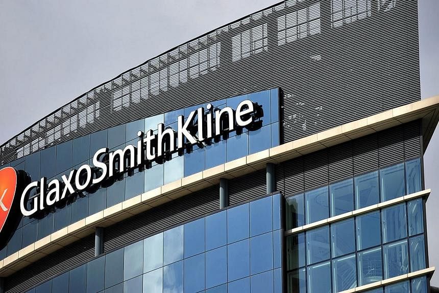 A file photo taken on July 29, 2013 shows a general view of the headquarters of the British pharmaceutical company GlaxoSmithKline in west London. -- PHOTO: AFP