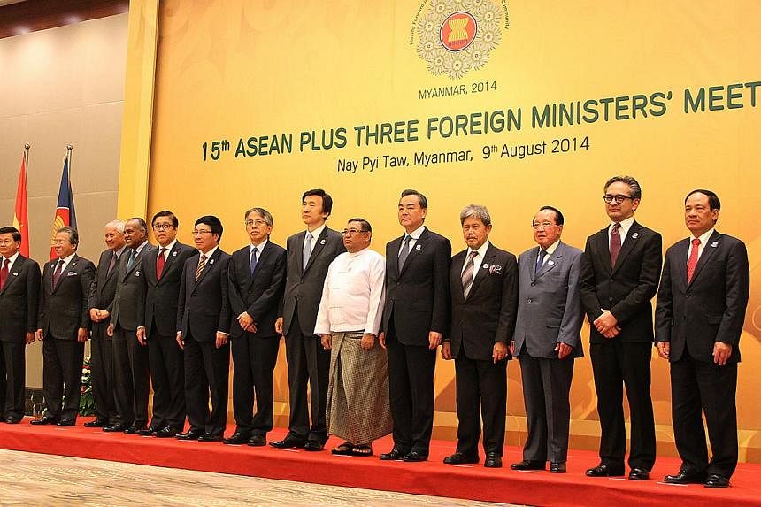 Singapore's Foreign Minister K Shanmugam with his counterparts at the 15th Asean Plus Three Foreign Ministers' Meeting. -- PHOTO: MINISTRY OF FOREIGN AFFAIRS
