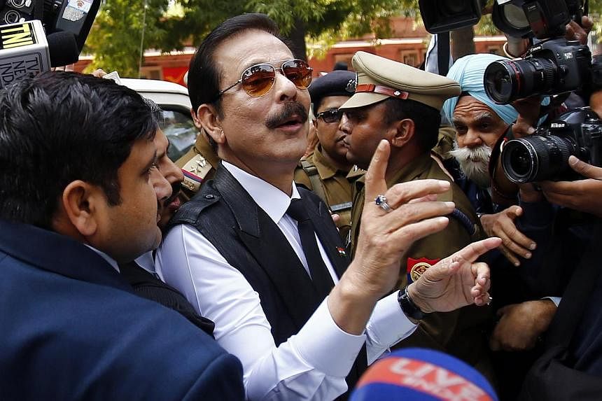 Sahara Group Chairman Subrata Roy (centre) arrives at the Supreme Court in New Delhi, in this file picture taken on March 4, 2014. -- PHOTO: REUTERS&nbsp;