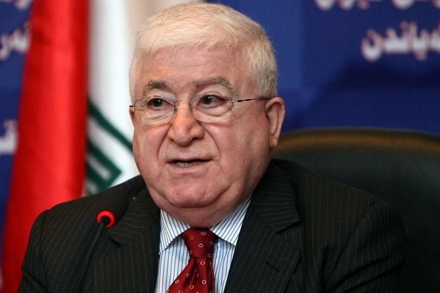 The United States threw its weight behind Iraqi President Fuad Masum (above) after Prime Minister Nuri al-Maliki announced on state television that he would be filing a complaint against Masum and as security forces massed in the capital. -- PHOTO: R
