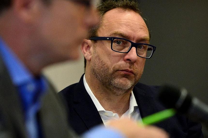 Jimmy Wales (right), co-founder of Wikipedia, attending a press conference in central London on August 6, 2014 ahead of the three-day Wikimania&nbsp;conference. -- PHOTO: AFP