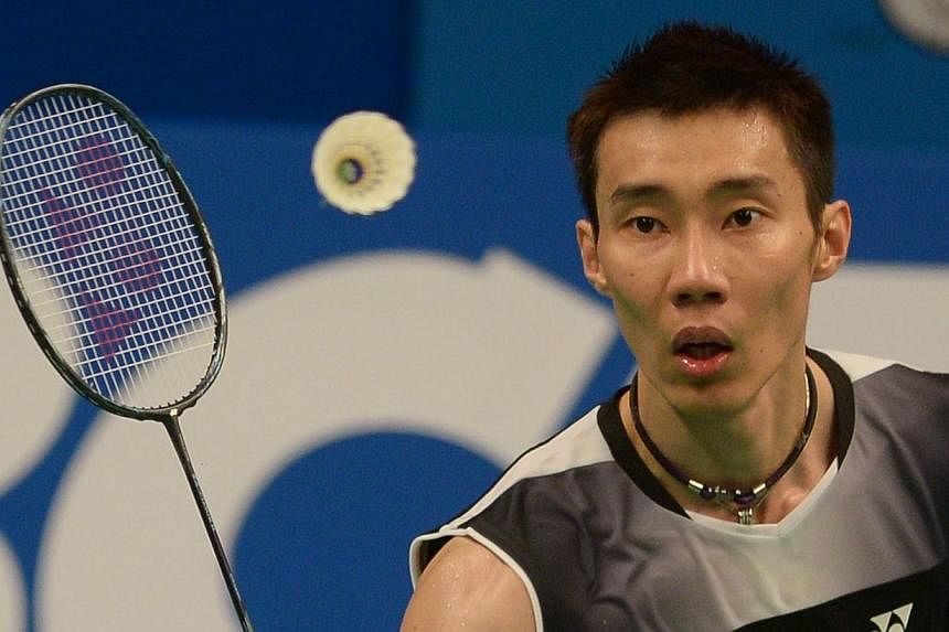 Lee Chong Wei of Malaysia returns a shuttlecock during the men's singles second round match against Brice Leverdez of France at the 2014 Indonesia Open in Jakarta on June 19.&nbsp;-- PHOTO: AFP