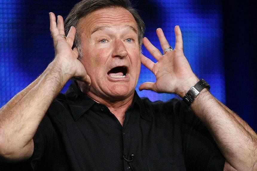 Robin Williams gestures during a panel discussion for his HBO show Robin Williams: Weapons of Self-Destruction at the Television Critics Association Cable summer press tour in Pasadena, California on July 30, 2009. -- PHOTO: REUTERS&nbsp;