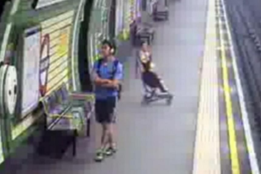 British police has released shocking footage of a pram rolling on to the London Underground train tracks with a child in it. -- SCREENGRAB: YOUTUBE