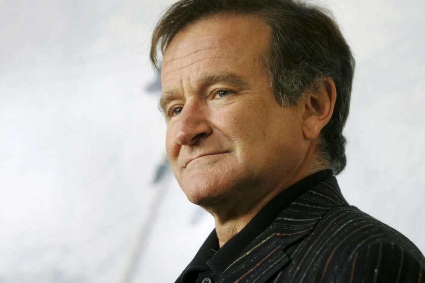 U.S. actor Robin Williams poses for photographers during a photocall in Rome in this file picture taken November 15, 2005. Oscar-winning actor and comedian Williams was found dead on Monday from an apparent suicide at his home in Northern California,