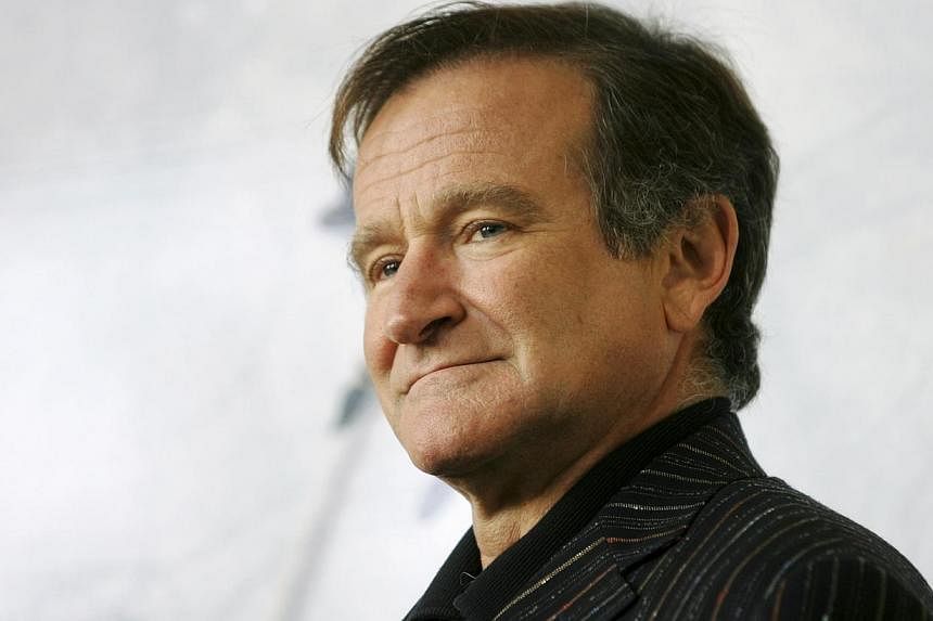 US actor Robin Williams poses for photographers during a photocall in Rome in this file picture taken on Nov 15, 2005. -- PHOTO: REUTERS
