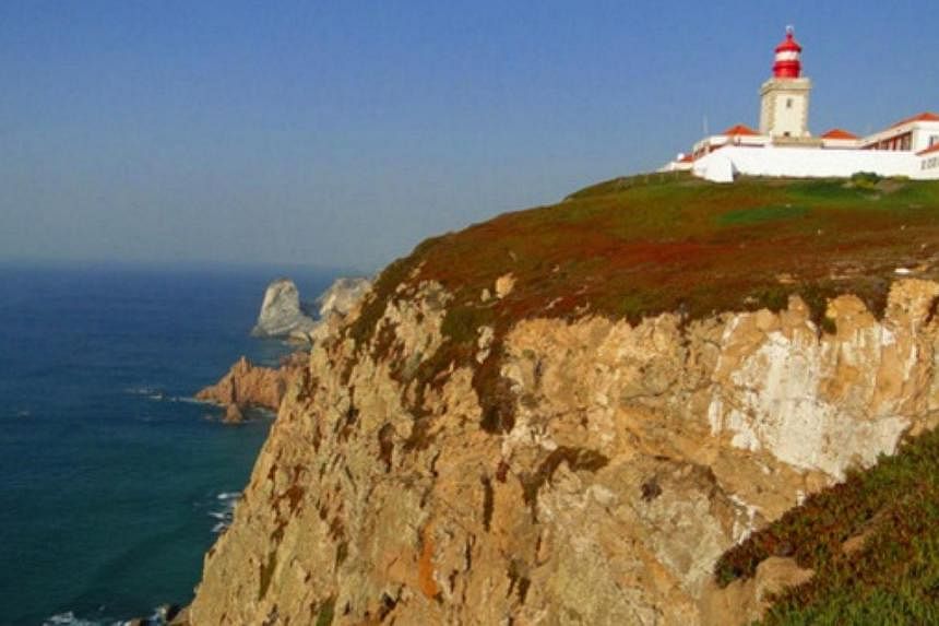 The Cabo da Roca lighthouse in Portugal. A Polish couple fell to their death while apparently trying to take selfies with their children on the edge of a cliff in Portugal's Cabo da Roca. Details of the incident are still unclear. -- PHOTO: TWITTER