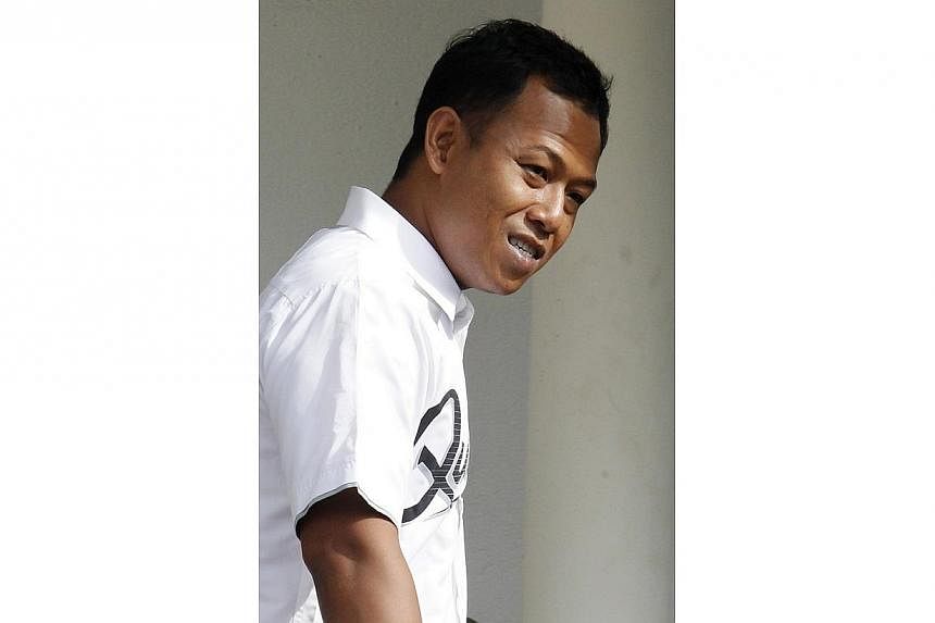 Fifty-three more charges were piled on car workshop owner Sollihin Anhar on Wednesday over an alleged road accident scam, bringing the total number he faces to 81. -- PHOTO: ST FILE&nbsp;