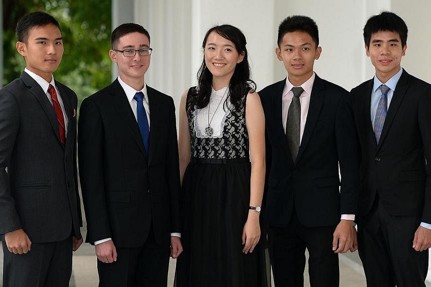 President's Scholarship recipients (from left) Eugene Lim Zhi Wei, Brendan Dean Zhi Min, Lee Zi Xin, Arturo Neo and Tommy Koh Kit Shaun. -- ST PHOTO: DESMOND WEE&nbsp;