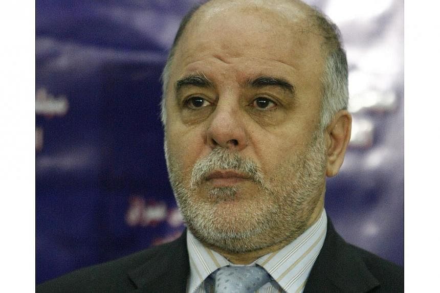 A file picture taken on November 22, 2009 shows Iraqi MP and Dawa party member Haidar al-Abadi in Baghdad. Iraq's National Alliance parliamentary bloc has chosen Mr Abadi as its nominee for prime minister in place of incumbent Nouri al-Maliki. -- PHO