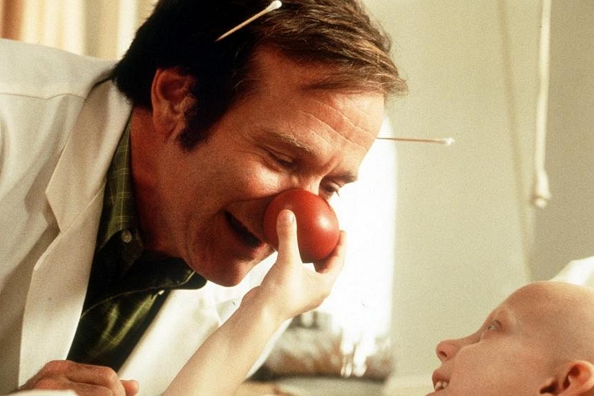 Robin Williams as Hunter "Patch" Adams. -- PHOTO: SLIDES