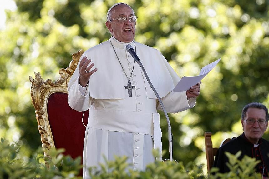 Pope Francis speaks outside the Castelpetroso sanctuary, near Isernia, south of Italy, on July 5, 2014. During his visit to Asia over August 13 to 18, the Pope hopes to make up for his predecessor Benedict XVI never visiting the continent during his 