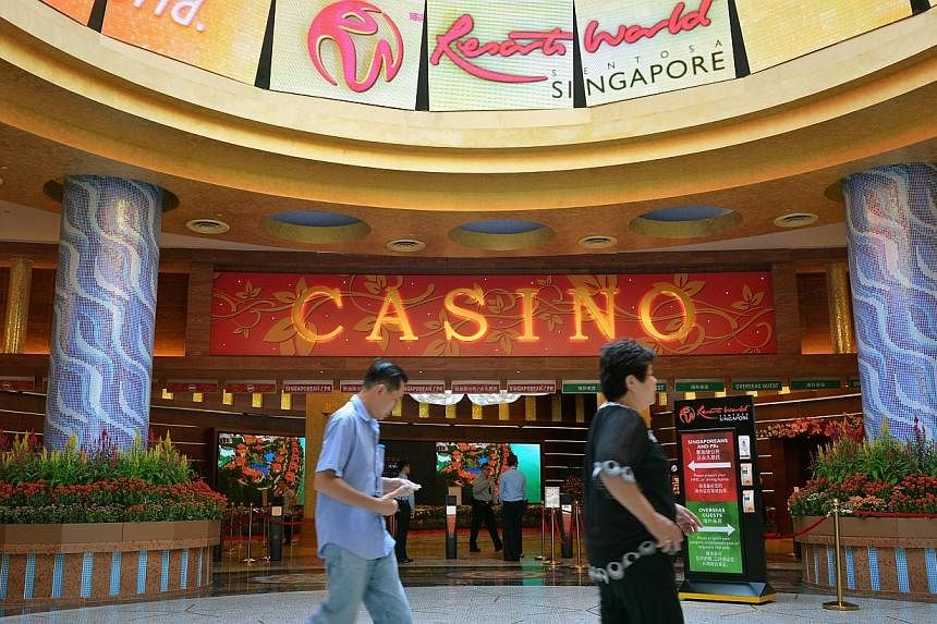 Genting Singapore - the casino operator that runs the Resorts World Sentosa (RWS) integrated resort - has posted a 27 per cent plunge in second-quarter net profit to $102.3 million, from $140.2 million a year earlier. -- PHOTO: ST FILE