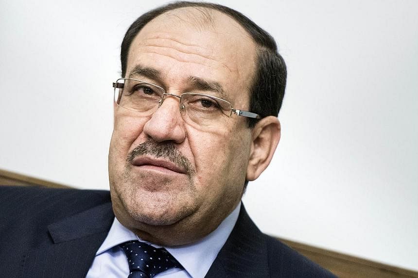 A file picture taken on June 23, 2014 shows Iraqi Prime Minister Nouri al-Maliki looking on during a meeting with the US Secretary of State at the Prime Minister's Office in Baghdad. Mr Maliki&nbsp;has refused to stand aside to allow his replacement 