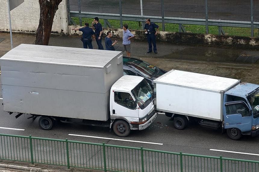 A driver reversed his vehicle into another lorry along Toa Payoh Lorong 1.&nbsp;-- ST PHOTO: JAMIE KOH