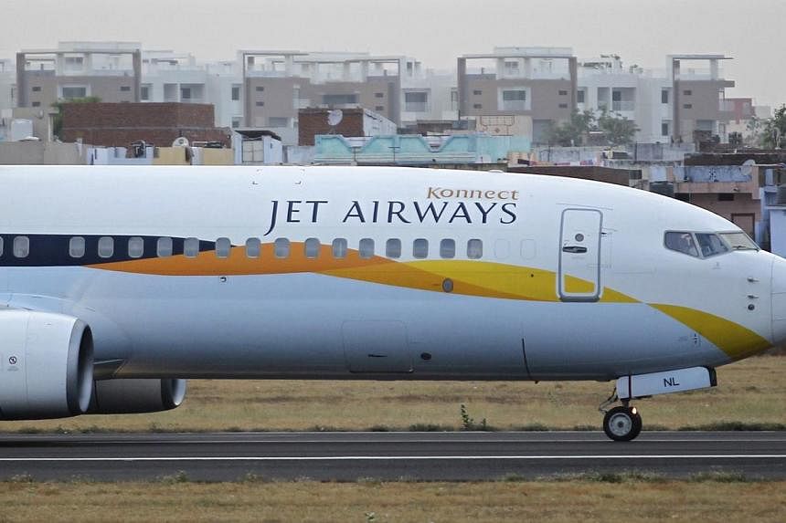 A Jet Airways passenger plane moves along the tarmac at the Sardar Vallabhbhai Patel international airport in the western Indian city of Ahmedabad.--&nbsp;PHOTO: REUTERS