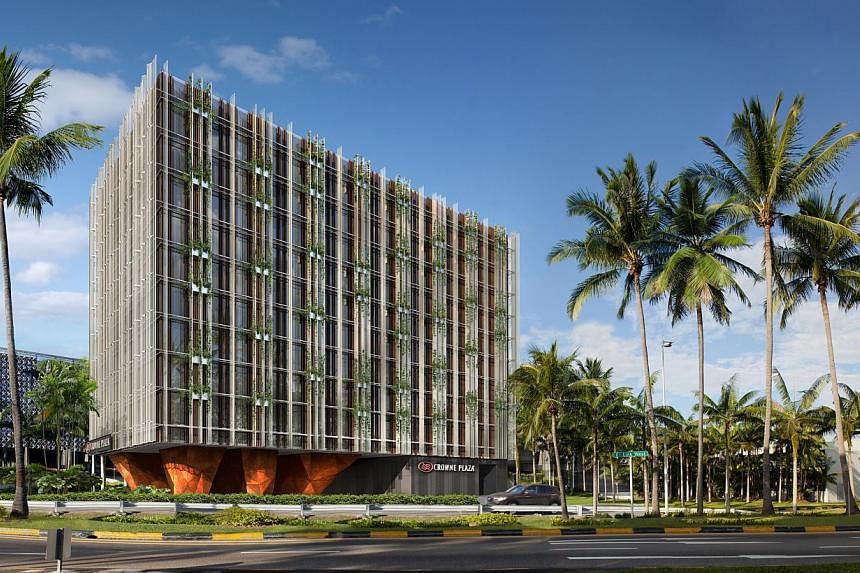 An artist's impression of developer OUE's 10-storey extension of Crowne Plaza Changi Airport hotel, which will be built using prefabricated modules with multiple units that are assembled on site. Successful bidders of selected government land sale si