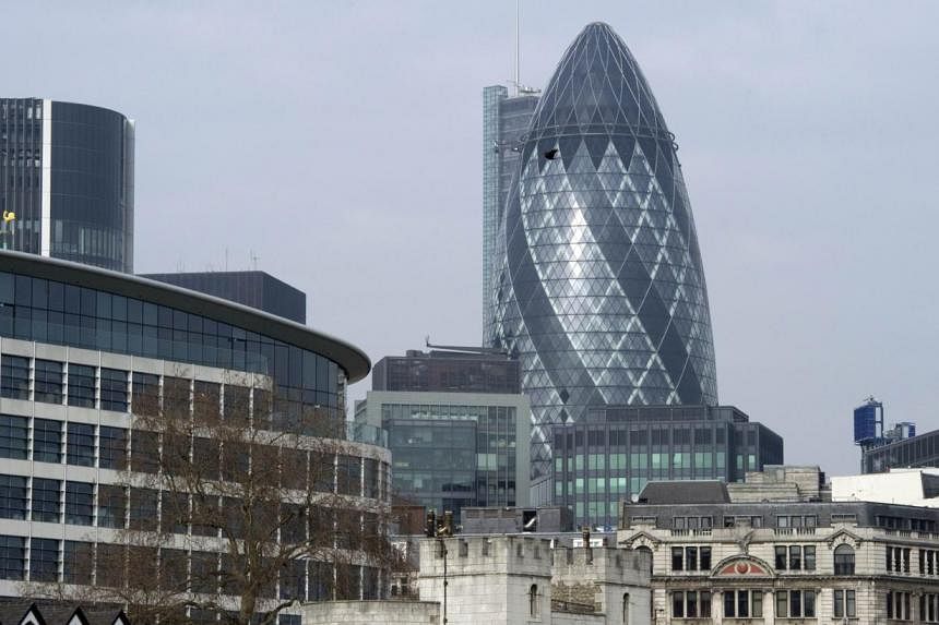 The City of London, London's main financial district. Britain's economy grew by 0.8 per cent in the second quarter of 2014 compared with output in the first three months of the year, official data showed on Friday. -- PHOTO: AFP