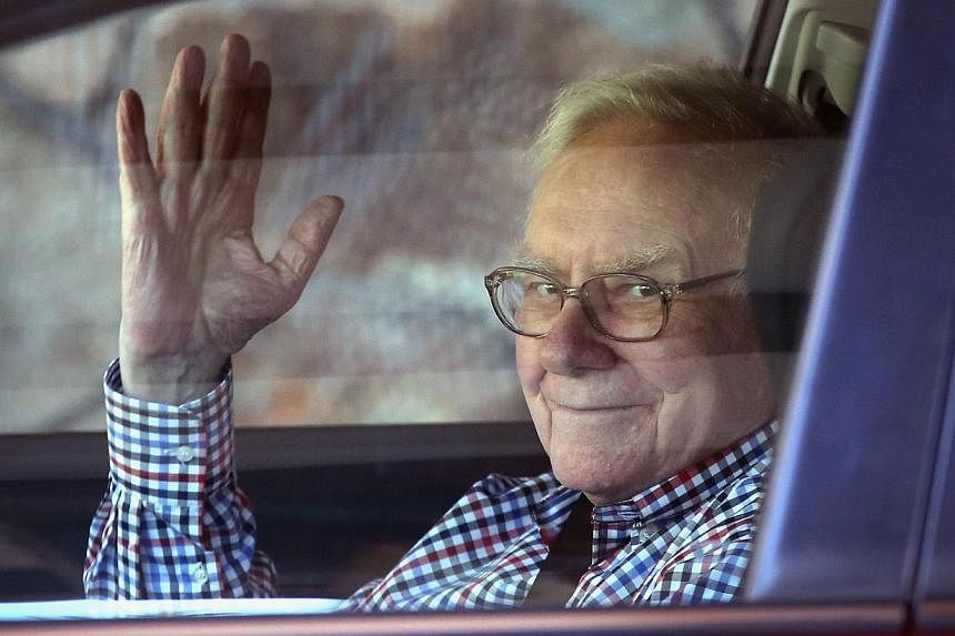 Chairman of Berkshire Hathaway Warren Buffett&nbsp;arrives for a conference on July 8, 2014 in Sun Valley, Idaho. The company's long-term gains have made Mr Buffett the world's third wealthiest man, his fortune worth US$65.9 billion (S$82 billion), a