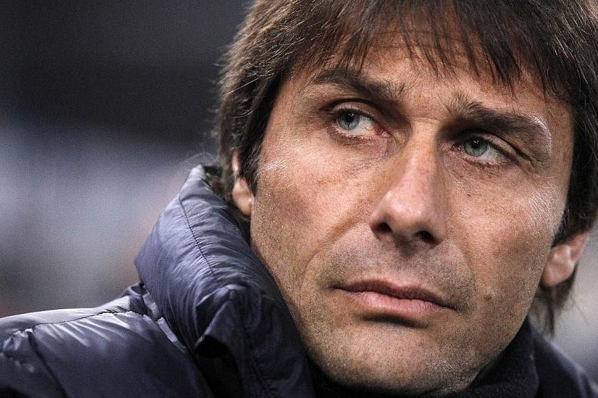 Antonio Conte, seen here in a&nbsp;March 2014 file photo, was named the new coach of Italy on Thursday on a two-year contract. -- PHOTO: AFP&nbsp;