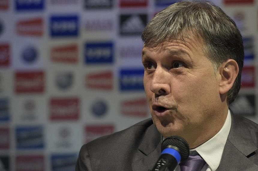 Argentina's national football team coach Gerardo Martino speaks during a press conference in Ezeiza, Buenos Aires, Argentina on August 14, 2014 during his presentation as new coach of Argentina's squad. -- PHOTO: AFP&nbsp;