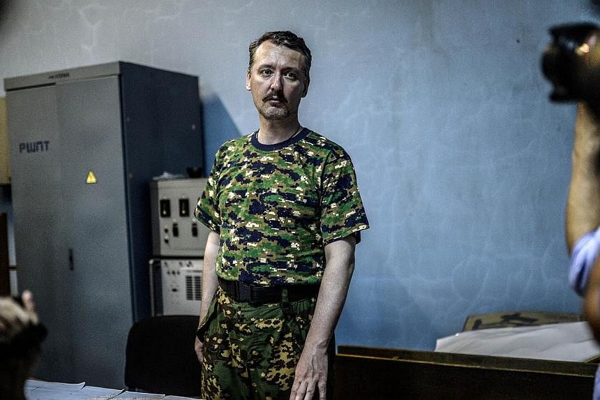 A file picture dated July 28, 2014 shows Igor Strelkov, the top military commander of the self-proclaimed "Donetsk People's Republic", delivering a press conference in Donetsk, eastern Ukraine. The main military commander of pro-Russian rebels battli